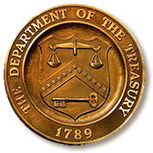 Bronze logo medallion of US Department of Treasury.